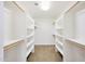 Walk-in closet with built-in shelves and lots of storage at 6525 N 3Rd St, Phoenix, AZ 85012