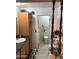 Bathroom view of vanity and sink, with an open doorway leading to the toilet at 730 N Karen Dr, Chandler, AZ 85224