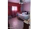 Bedroom with a ceiling fan and a large window dressed with peach colored drapes at 730 N Karen Dr, Chandler, AZ 85224