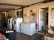 Laundry room with washer, dryer, freezer, and storage, with access to the exterior at 730 N Karen Dr, Chandler, AZ 85224