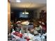 View of a cluttered living room with furniture and personal belongings at 730 N Karen Dr, Chandler, AZ 85224