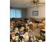 Living room filled with boxes and furniture, natural light from window at 730 N Karen Dr, Chandler, AZ 85224
