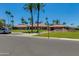 Well-manicured Camelback Village Racquet & Health Club with lush greenery and ample parking at 7810 E Via Camello -- # 72, Scottsdale, AZ 85258