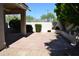 Backyard with a built-in barbeque area and a covered patio area at 7979 E Princess Dr # 8, Scottsdale, AZ 85255