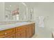Bathroom vanity featuring tile accents and granite countertops at 8298 E Tailfeather Dr, Scottsdale, AZ 85255