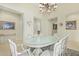 Formal dining area featuring elegant decor, and an ornate table set for eight at 8298 E Tailfeather Dr, Scottsdale, AZ 85255