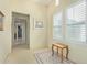 Hallway with view to bedrooms featuring neutral walls and decorative rug at 8298 E Tailfeather Dr, Scottsdale, AZ 85255