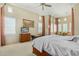 Spacious main bedroom features sitting area, neutral palette, and natural light at 8298 E Tailfeather Dr, Scottsdale, AZ 85255