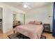 This bedroom features a large mirrored closet, comfortable bed, and natural light at 844 E Ruth Ave, Phoenix, AZ 85020