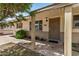 Inviting covered front porch, security door, and desert landscaping at 844 E Ruth Ave, Phoenix, AZ 85020