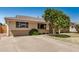 Home with well-kept lawn, mature landscaping, and a long driveway at 844 E Ruth Ave, Phoenix, AZ 85020