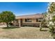 Charming one-story home with mature flowering bushes and well-maintained front lawn at 844 E Ruth Ave, Phoenix, AZ 85020