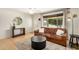 Inviting living room with hardwood floors, ceiling fan, and contemporary decor at 844 E Ruth Ave, Phoenix, AZ 85020