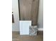 A curated selection of modern interior materials, including granite, woodgrain floors, and paint trim at 8552 N 175Th Ln, Waddell, AZ 85355