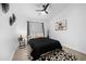 Bedroom featuring a vaulted ceiling, decorative vases, and warm-toned wood flooring at 8776 E Brilliant Sky Cir, Gold Canyon, AZ 85118