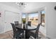 Bright dining area with a backyard pool view from the bay windows at 8776 E Brilliant Sky Cir, Gold Canyon, AZ 85118