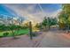 Golf course view on a beautiful walking path with desert landscaping in the Gold Canyon community at 8776 E Brilliant Sky Cir, Gold Canyon, AZ 85118