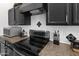 Close up of kitchen counter featuring stainless steel appliances and modern backsplash at 8776 E Brilliant Sky Cir, Gold Canyon, AZ 85118