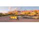 Community park bench with mountain views in the background at 8776 E Brilliant Sky Cir, Gold Canyon, AZ 85118