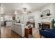 Bright living room featuring an open concept to the kitchen and dining area at 921 W University Dr # 1232, Mesa, AZ 85201