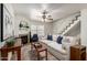Bright living room featuring a fireplace, comfortable seating, and staircase access to upper level at 921 W University Dr # 1232, Mesa, AZ 85201