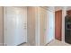 Foyer features a white front door and tiled floor, with a pantry and closet at 9820 N Central Ave # 212, Phoenix, AZ 85020