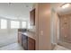 Cozy kitchen with essential appliances and a view into the open floor plan at 9820 N Central Ave # 212, Phoenix, AZ 85020