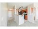 Cozy kitchen features wood cabinets, granite countertops, and modern black appliances at 9820 N Central Ave # 212, Phoenix, AZ 85020