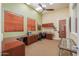 Office space equipped with desk, storage, and natural light at 9820 N Central Ave # 212, Phoenix, AZ 85020