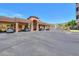 Exterior view of the covered parking area with multiple parking spaces at 9820 N Central Ave # 212, Phoenix, AZ 85020