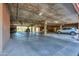 Well-lit parking garage offering ample parking spaces for residents and guests, ensuring convenience and security at 9820 N Central Ave # 212, Phoenix, AZ 85020