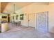 Enjoy the covered patio space featuring a ceiling fan, dining table, and outdoor shower to enhance your outdoor experience at 9820 N Central Ave # 212, Phoenix, AZ 85020
