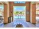 View of the community pool that features lounge chairs and Mountain View at 9820 N Central Ave # 212, Phoenix, AZ 85020