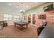 Recreation room includes a pool table, dart board and comfortable seating at 9820 N Central Ave # 212, Phoenix, AZ 85020