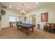 Recreation room featuring a pool table, TV, and comfortable seating at 9820 N Central Ave # 212, Phoenix, AZ 85020