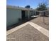 Well-kept backyard area with a covered patio, desert landscaping, and concrete accents at 1010 W 13Th St, Tempe, AZ 85281