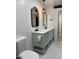 Updated bathroom features a double sink vanity with modern lighting and neutral decor at 1010 W 13Th St, Tempe, AZ 85281