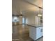 An open-concept living space boasts luxury vinyl floors and neutral walls, ready for personalized decor at 1010 W 13Th St, Tempe, AZ 85281