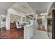 Elegant dining room with modern lighting, sleek furnishings, and wood flooring at 10638 E Honey Mesquite Dr, Scottsdale, AZ 85262