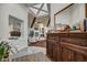 Inviting foyer with high ceilings and an open floor plan, leading to a cozy living space at 10638 E Honey Mesquite Dr, Scottsdale, AZ 85262