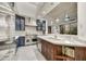 Gourmet kitchen featuring stainless steel appliances, large island, and modern cabinetry at 10638 E Honey Mesquite Dr, Scottsdale, AZ 85262