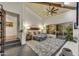 Spacious living room with a beamed ceiling, ample seating, and a view to the outside at 10638 E Honey Mesquite Dr, Scottsdale, AZ 85262