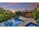 Inviting pool area with comfortable outdoor seating and direct access to the home's interior at 10638 E Honey Mesquite Dr, Scottsdale, AZ 85262