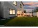 Backyard featuring covered patio, fire pit, and seating area at 11541 E Corbin Ave, Mesa, AZ 85212