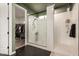 Stunning bathroom featuring a walk-in shower with white subway tile and a spacious walk-in closet at 11541 E Corbin Ave, Mesa, AZ 85212