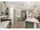 Kitchen features white countertop, stainless steel appliances, green cabinets and wood floors at 11541 E Corbin Ave, Mesa, AZ 85212