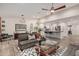 Open-concept living area connecting to the kitchen, showcasing modern decor and ample space at 11822 S Coconino St, Phoenix, AZ 85044