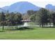 Picturesque golf course with a water feature, offering beautiful views and recreational opportunities at 12222 N Paradise Village S Pkwy # 325, Phoenix, AZ 85032