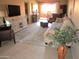 Bright living room with a large window, comfortable seating, and modern decor at 12222 N Paradise Village S Pkwy # 325, Phoenix, AZ 85032