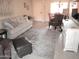 Inviting living room with plush seating, a neutral color scheme, and stylish furniture at 12222 N Paradise Village S Pkwy # 325, Phoenix, AZ 85032